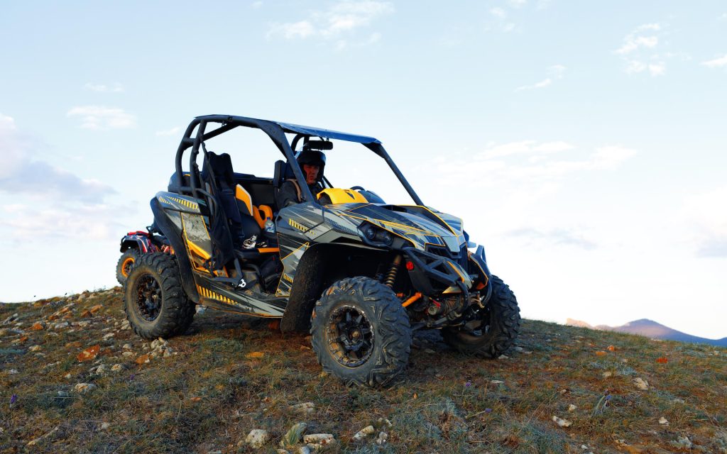 man-in-helmet-sitting-on-atv-quad-bike-in-mountain-2021-09-03-18-58-10-utc.jpg